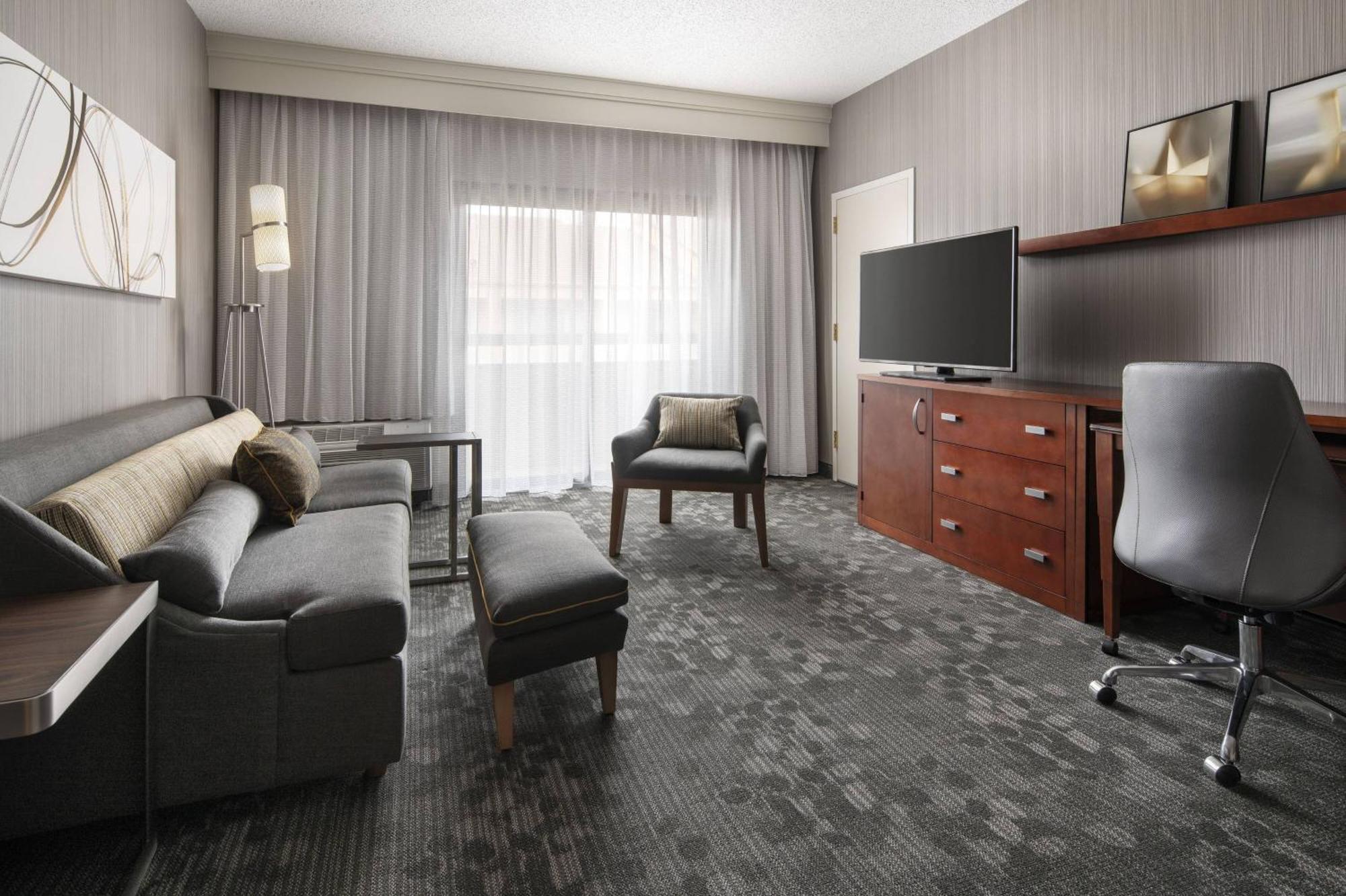 One-Bedroom King Suite Sofa Bed Adapted Tub Mobility Hearing Accessible,1643158504:JPEG