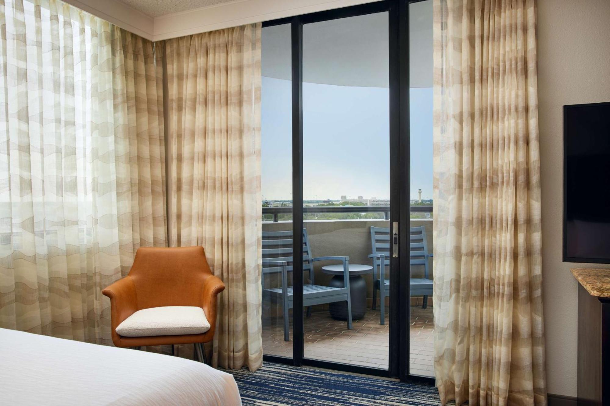 Two-Room Corner Suite Two Queen Beds Sleeper Sofa Balcony,1705721218:JPEG
