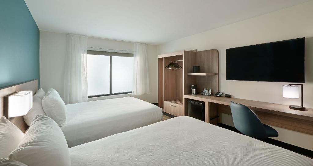 Queen Room with Two Queen Beds, Sofa Bed and Accessible Tub